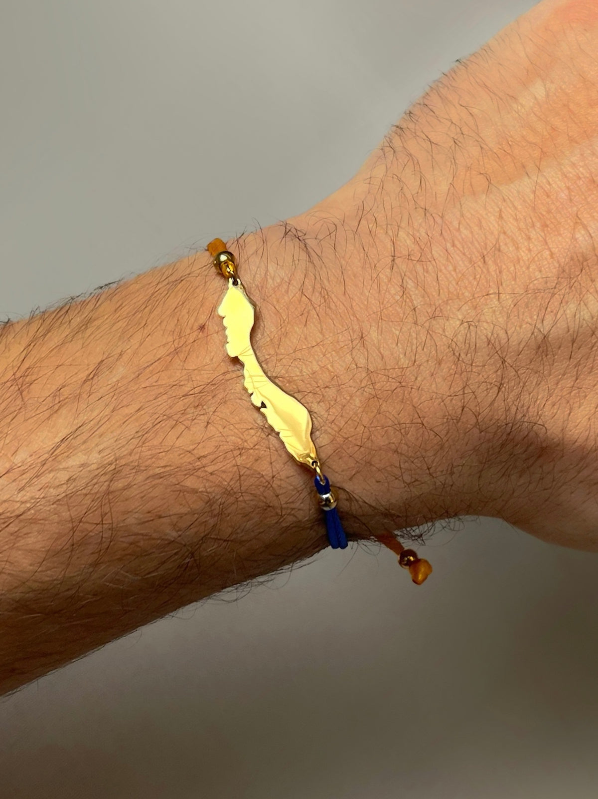 Men's Curaçao flag-colour cord bracelet with larger island silhouette
