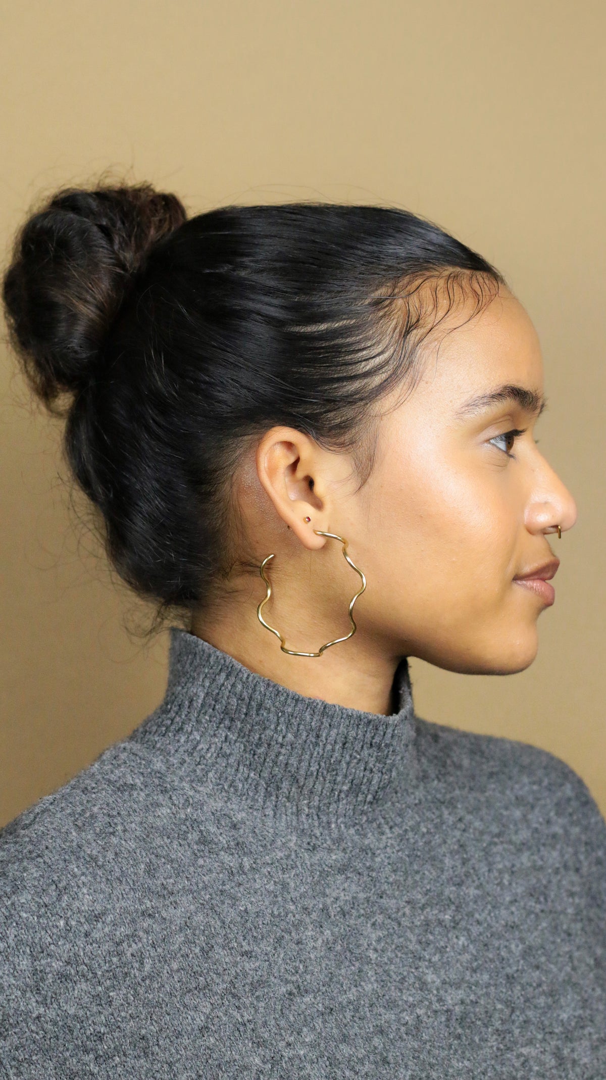 Ola sculptural wave-shaped hoop earrings by Concept Statement