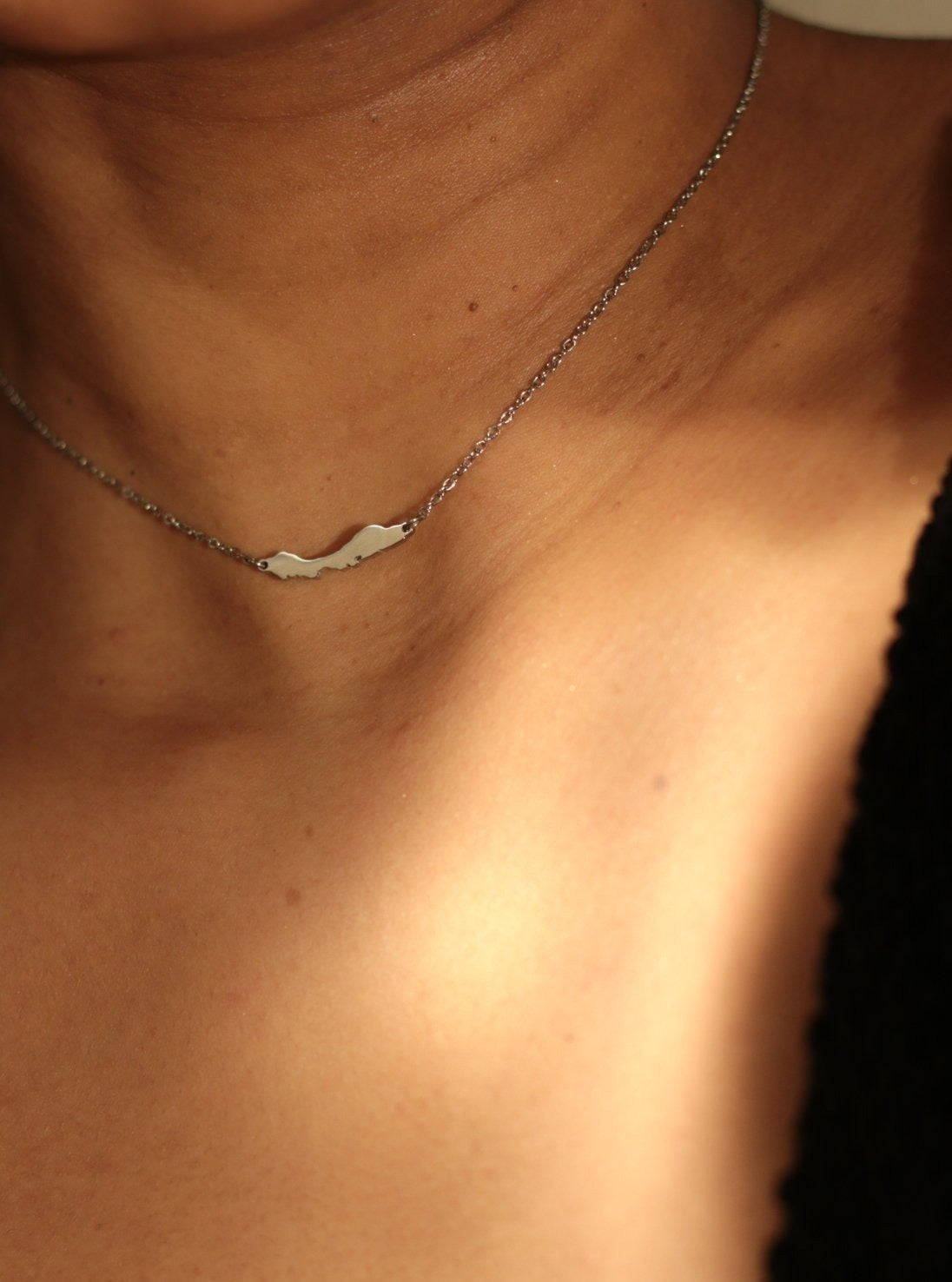Silver-tone OG Petite Curaçao necklace featuring both island silhouettes