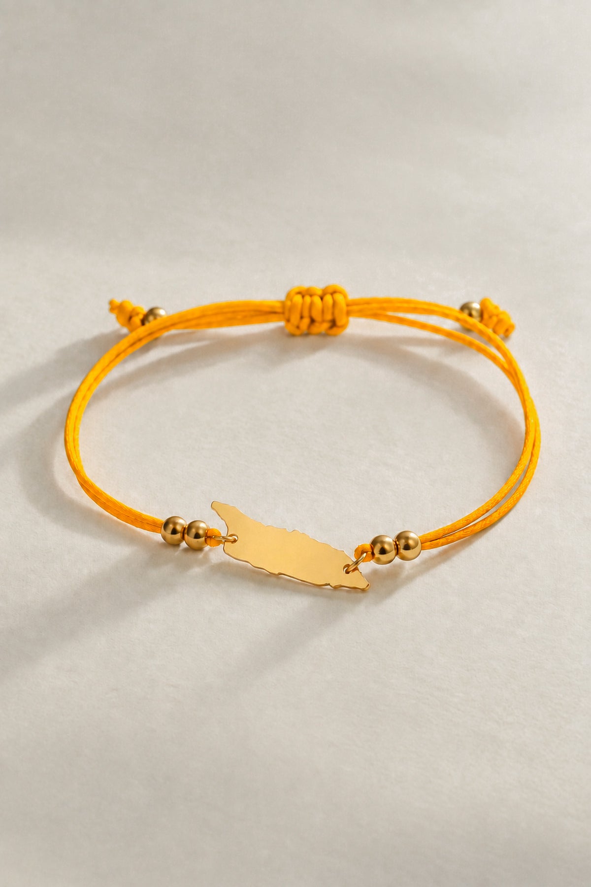 Pumpkin yellow Aruba island cord bracelet