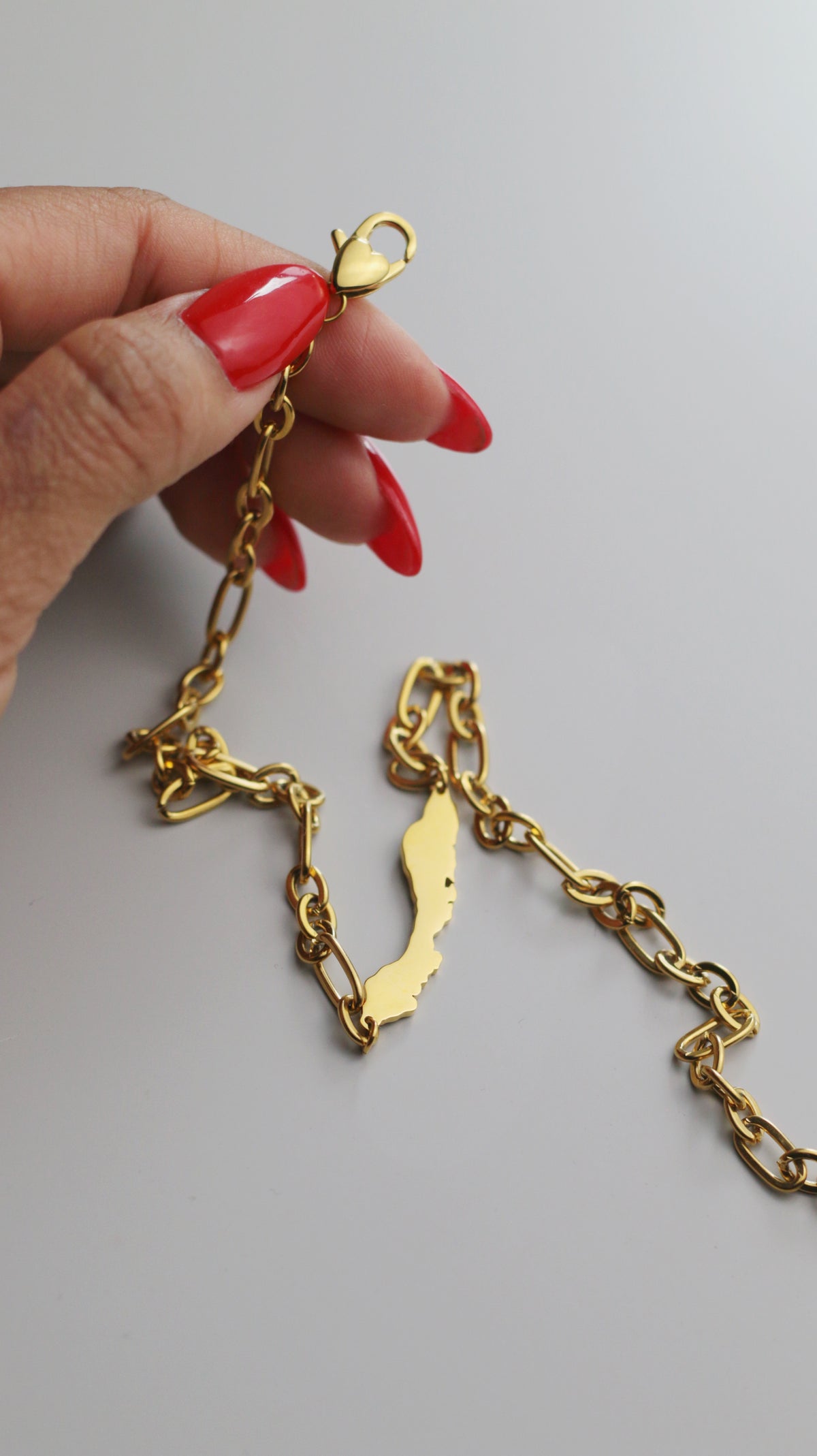 Gold OG Curaçao Heavy Necklace signature heart clasp detail by Concept Statement