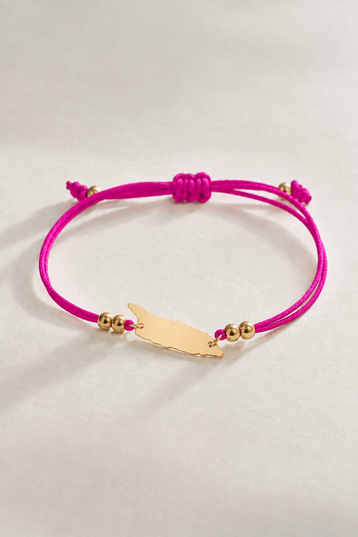 Fuchsia Aruba island cord bracelet