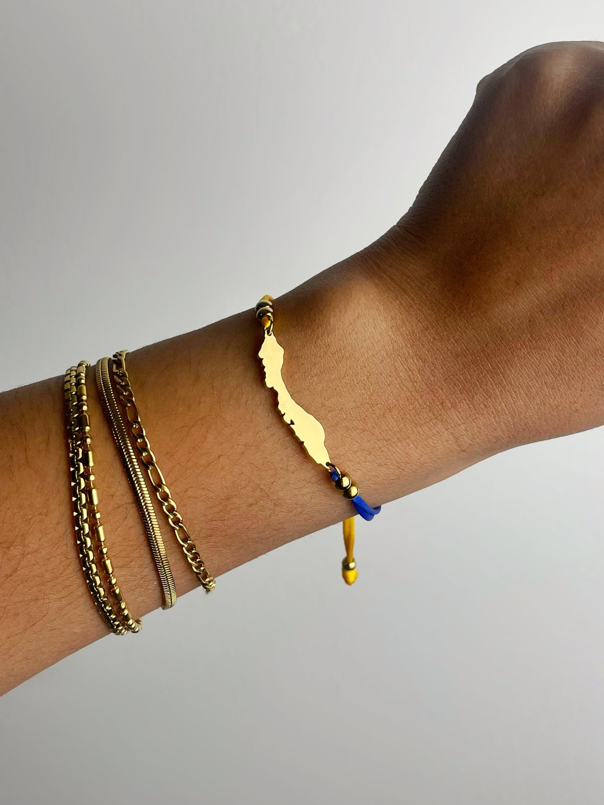 Concept Statement Curaçao island cord bracelet in flag colours