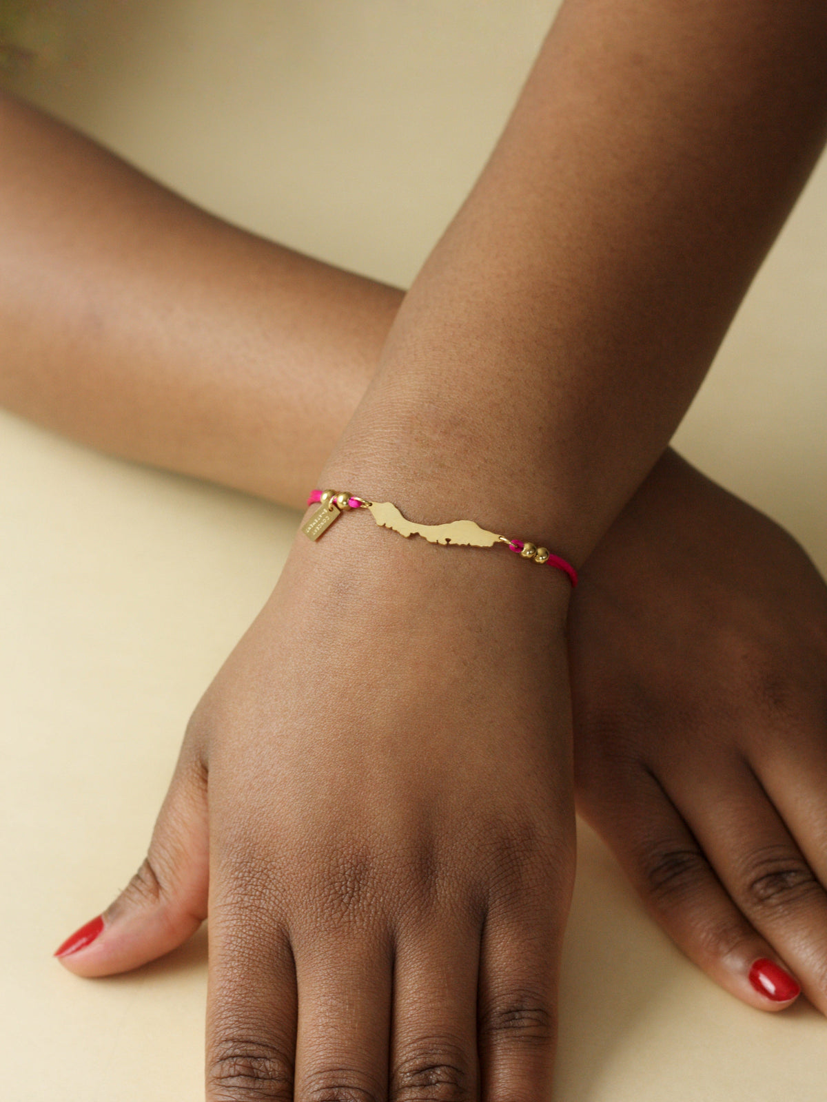 Fuchsia Curaçao island cord bracelet