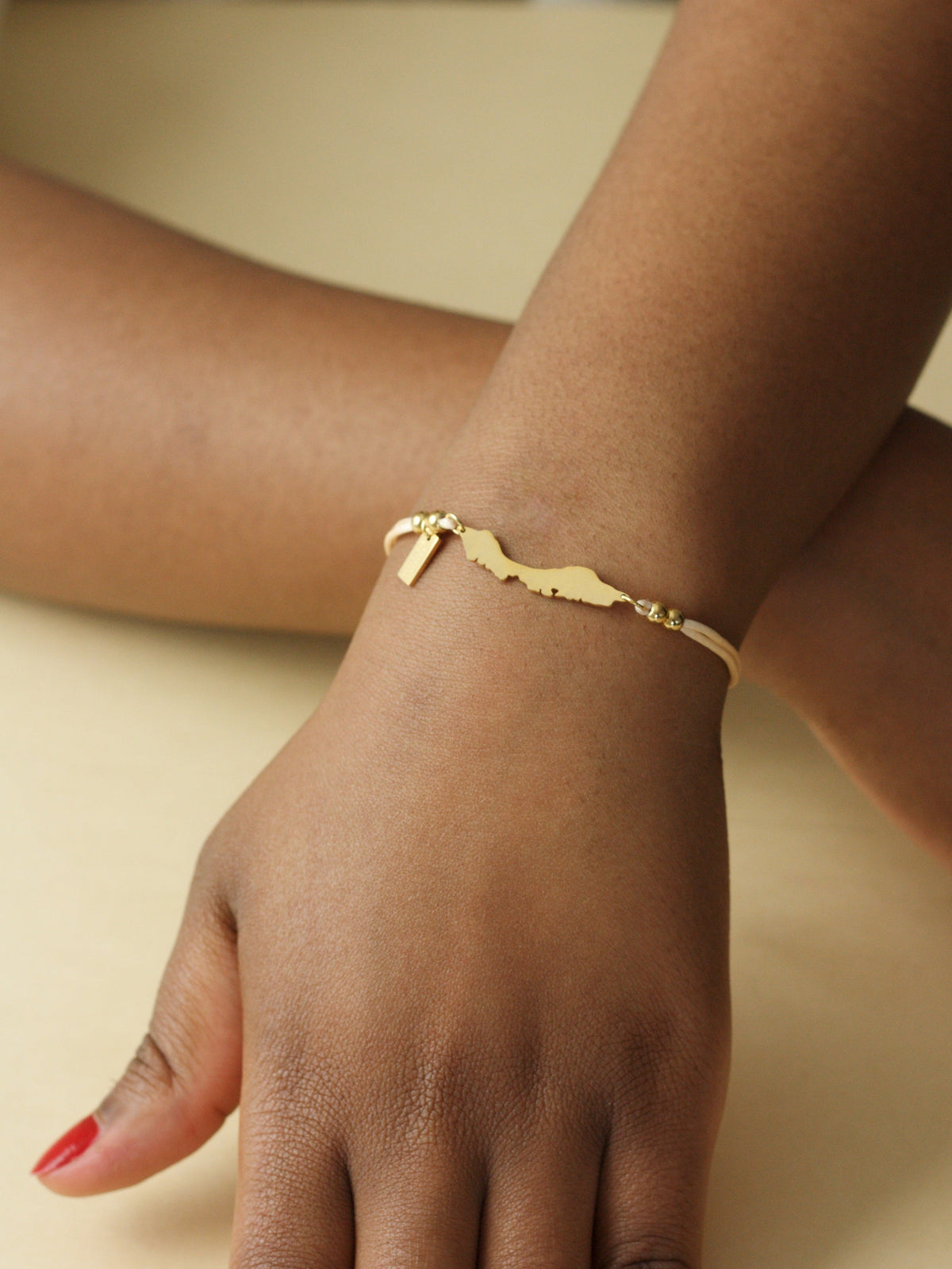 Nude pink Curaçao island cord bracelet