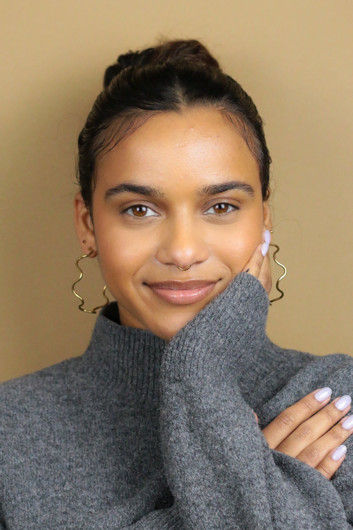 Ola sculptural wave-shaped hoop earrings by Concept Statement