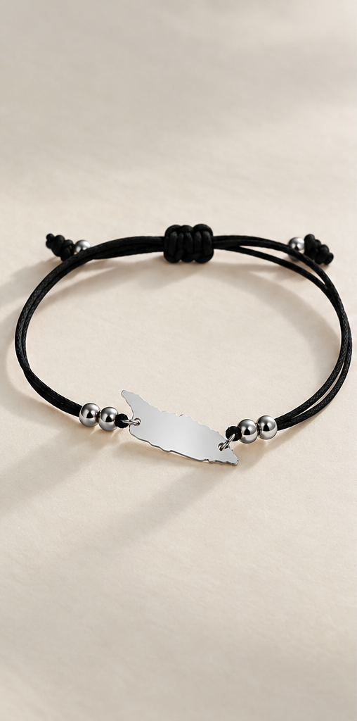 Black Aruba cord bracelet with silver-tone metal details