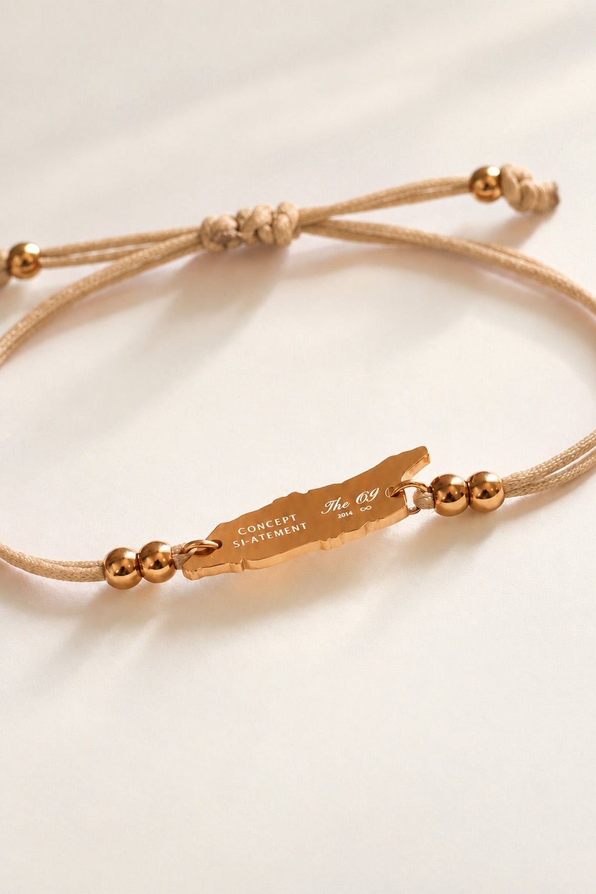 Close-up of sand-coloured Aruba cord bracelet