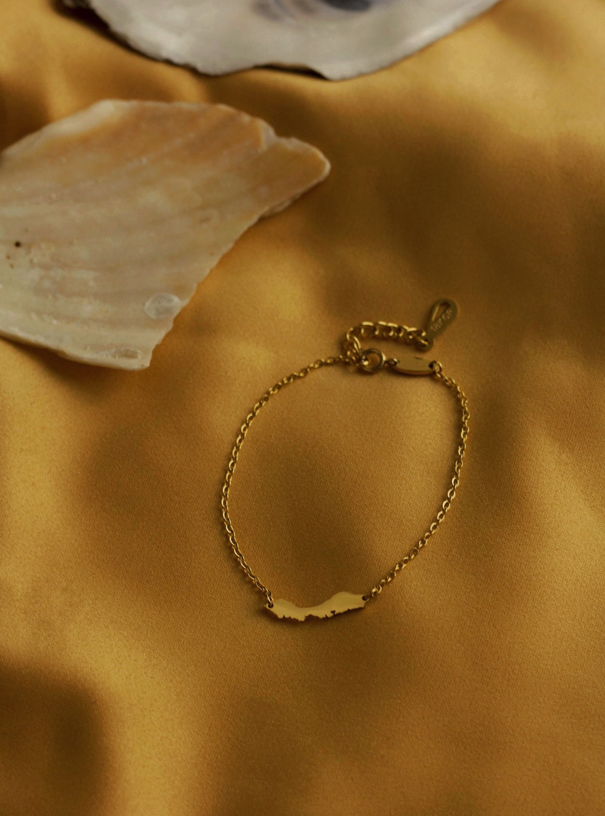 Gold-tone OG Petite Curaçao bracelet by Concept Statement