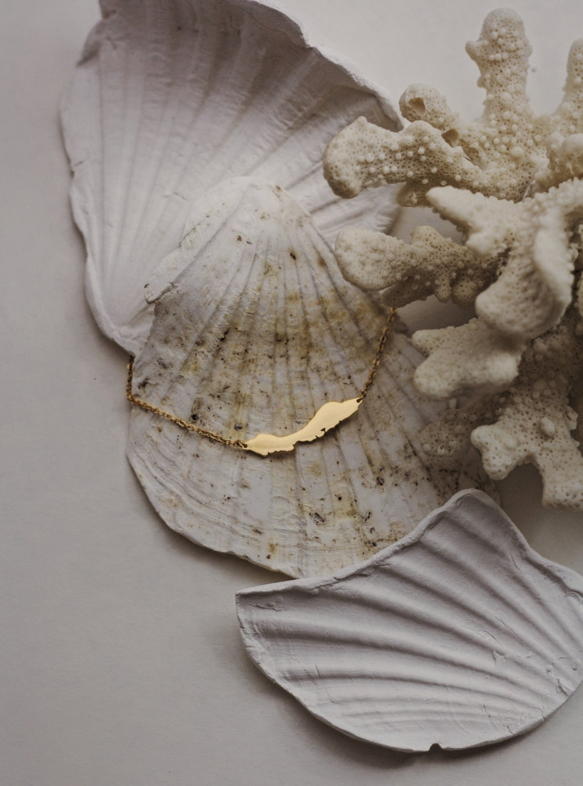 The OG Curaçao island silhouette necklace by Concept Statement