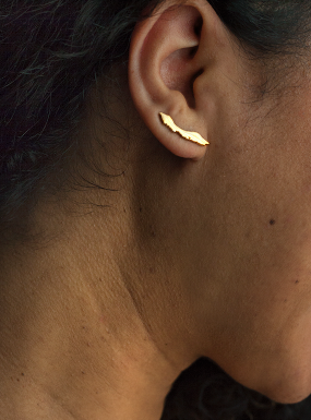 The OG Curaçao island silhouette ear climber earrings by Concept Statement