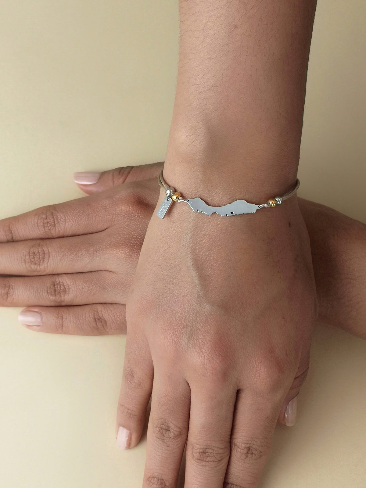 Neutral-coloured Curaçao island cord bracelet