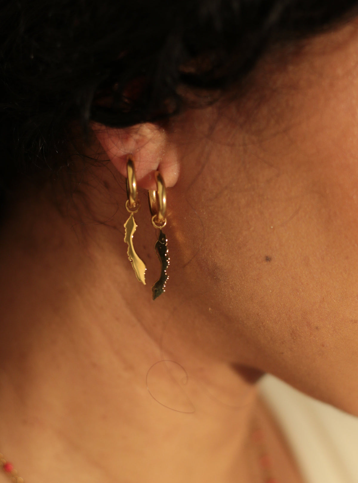 Gold-tone OG Curaçao dangle huggie hoop earrings with island charms