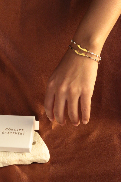 Curacao bracelet in gold with white and black details
