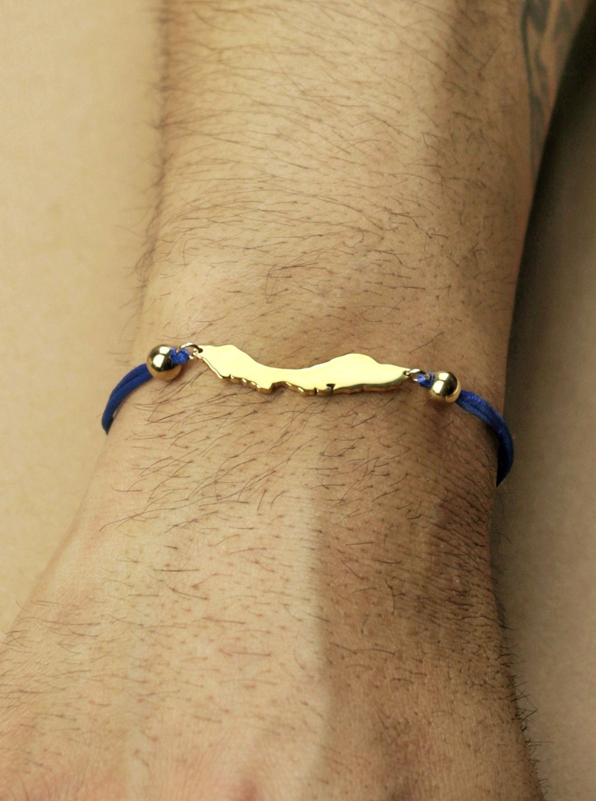 Men's Curaçao island cord bracelet in vibrant blue
